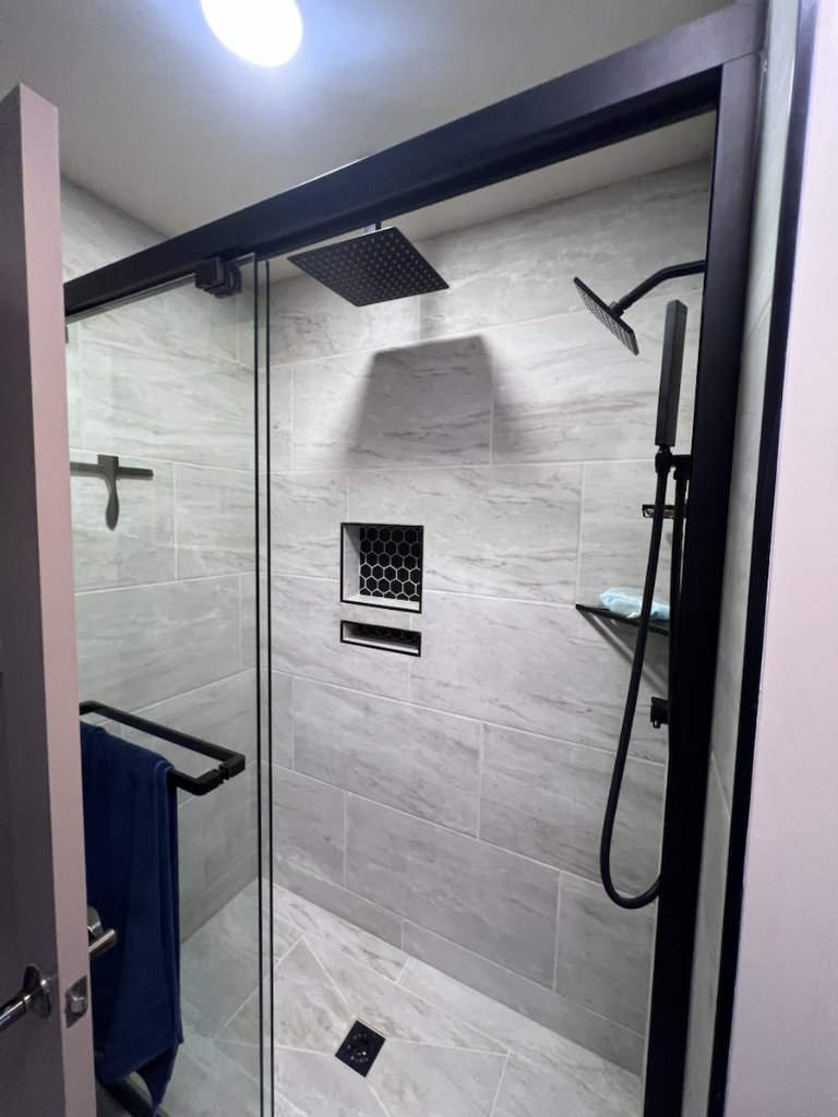 Finished shower remodel with clean caulking and sealing details in Jacksonville, FL