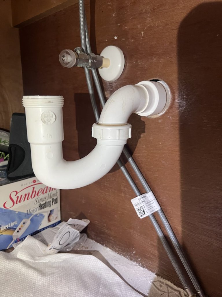 Sink P-trap and drain repair under a cabinet in Jacksonville, FL