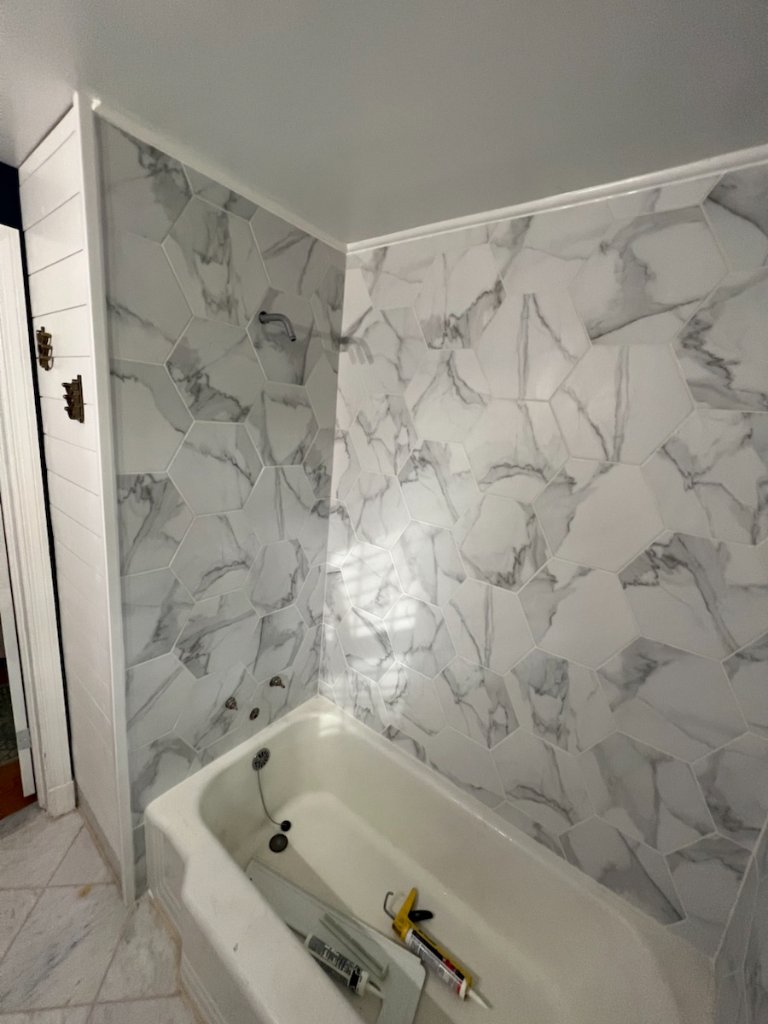 Tile shower after completion in Jacksonville, FL by Heylo Home