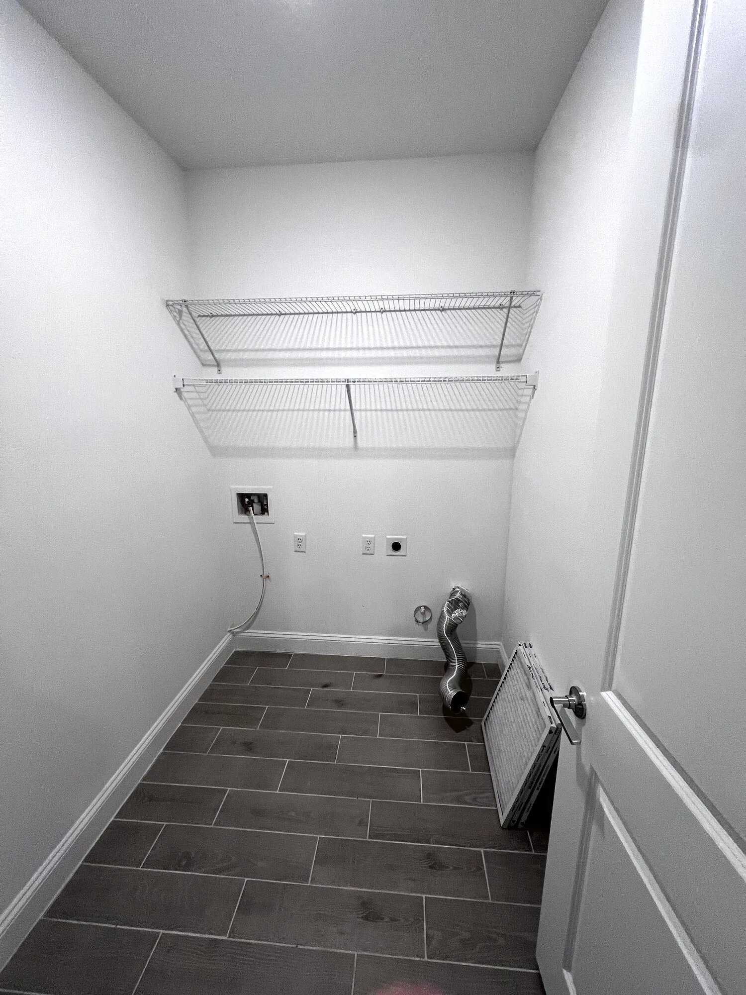 Laundry wall before overhead cabinets were installed