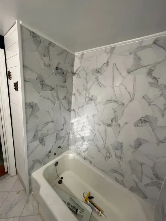 Tile shower after completion in Jacksonville, FL by Heylo Home