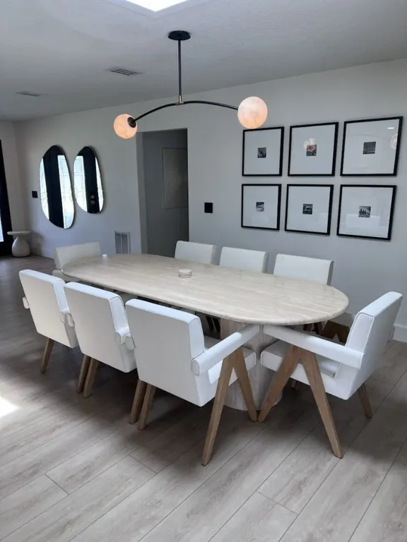 Dining room light fixture installation in Jacksonville, FL by Heylo Home