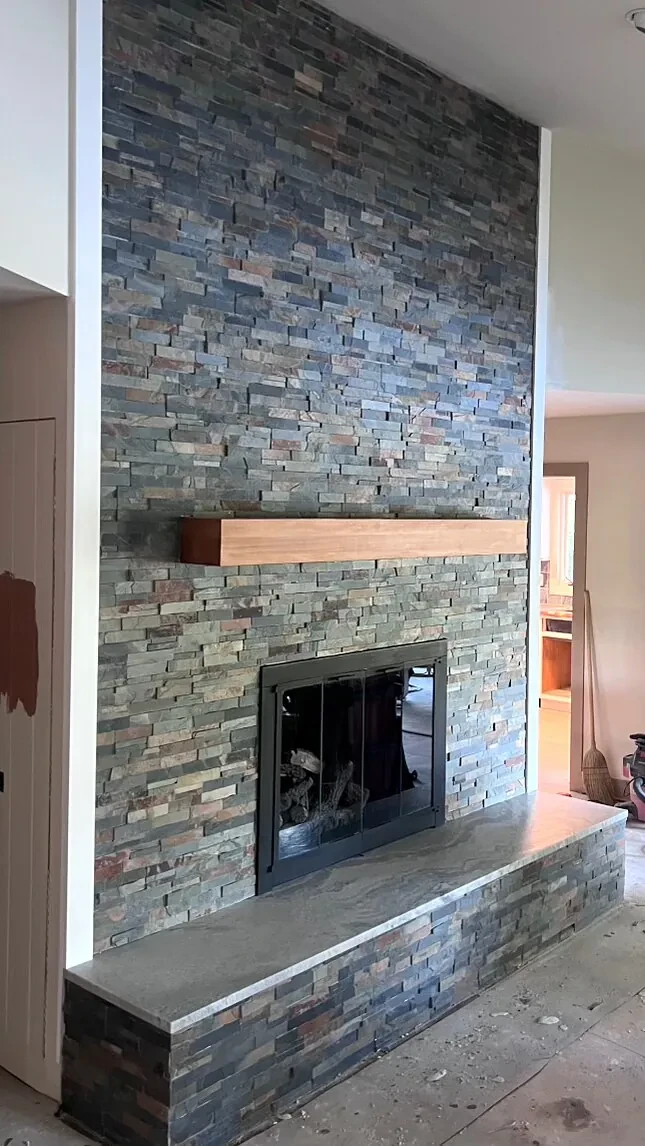 After photo 2 of the stone ledger fireplace