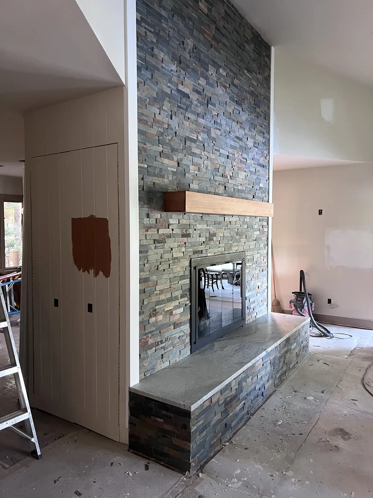 After photo 3 of the stone ledger fireplace