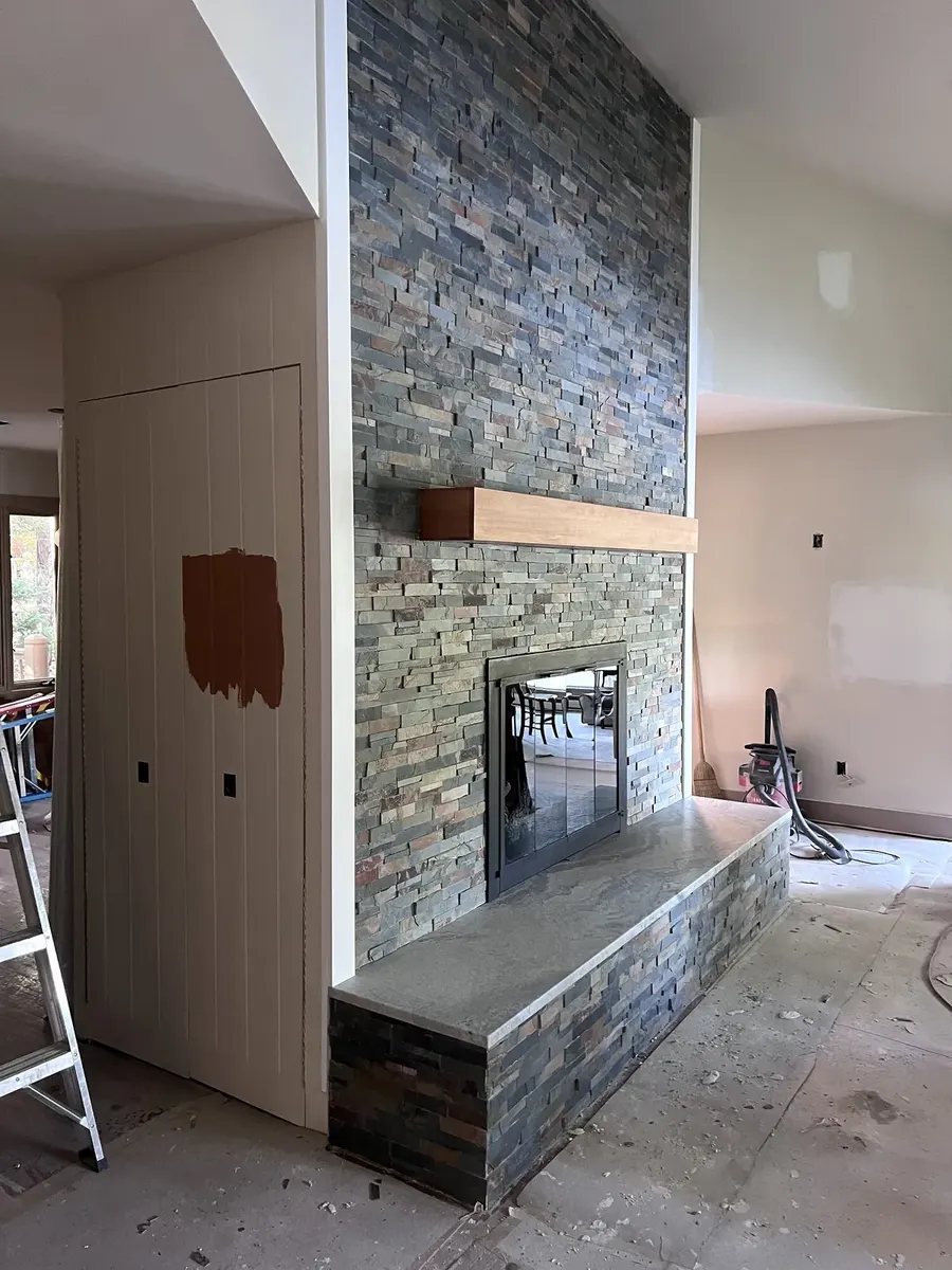 After photo 3 of the stone ledger fireplace