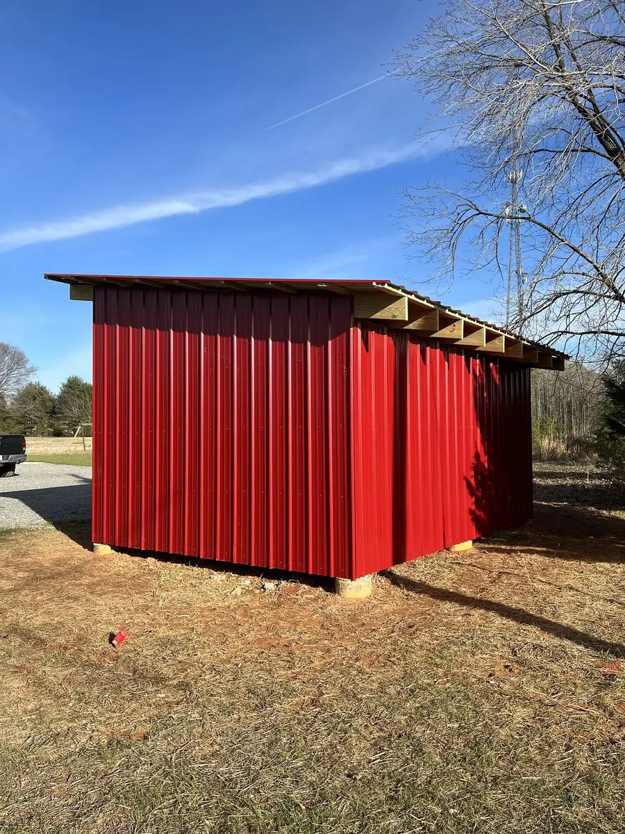 After photo 3 of the open-front storage shed