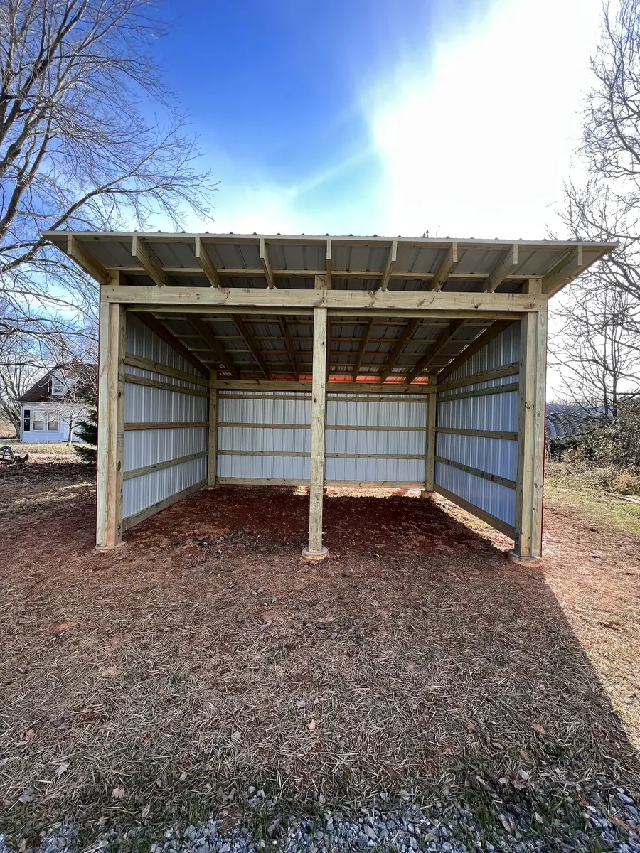 After photo 5 of the open-front storage shed