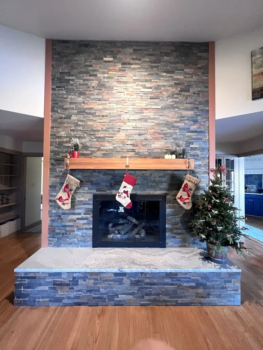 Completed stone ledger fireplace