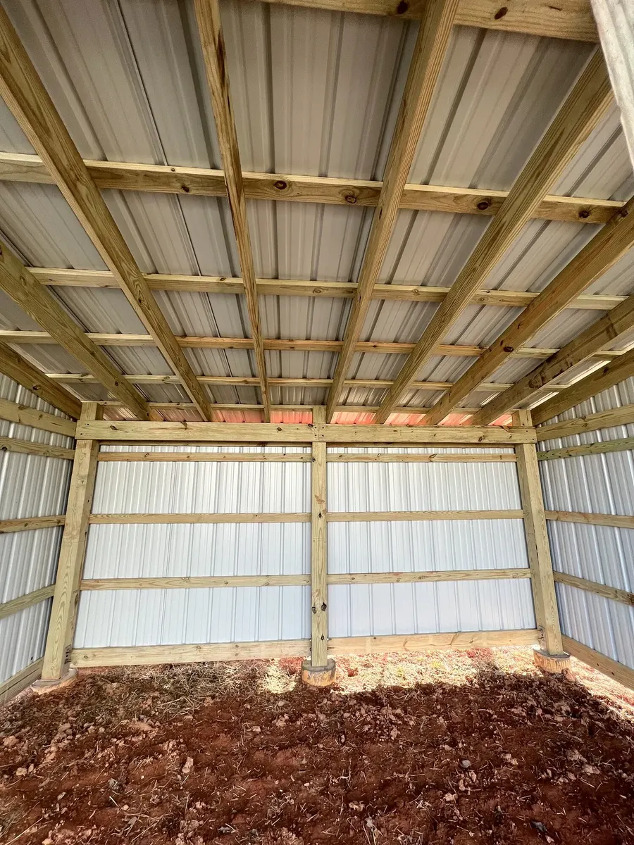 After photo 6 of the open-front storage shed