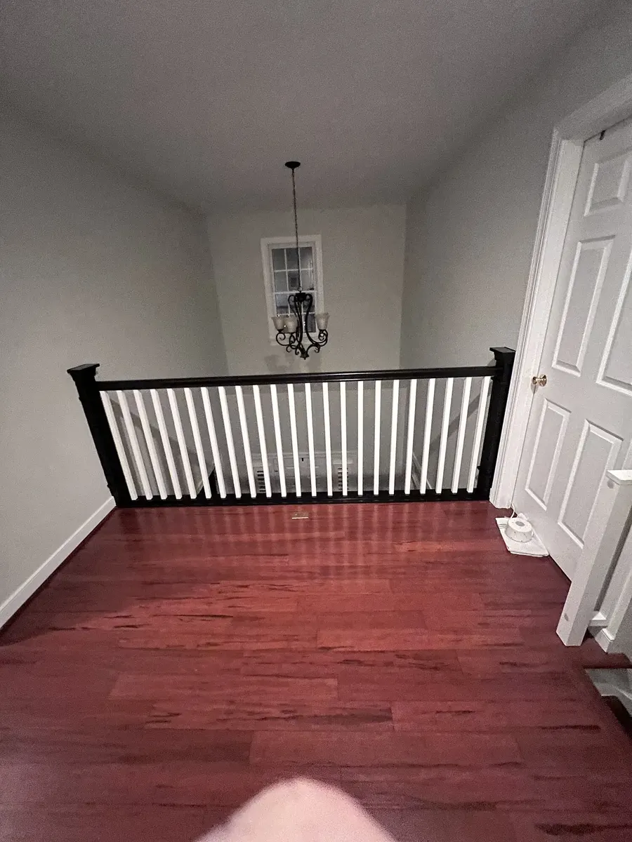 After photo 8 of the stair railing and baluster update