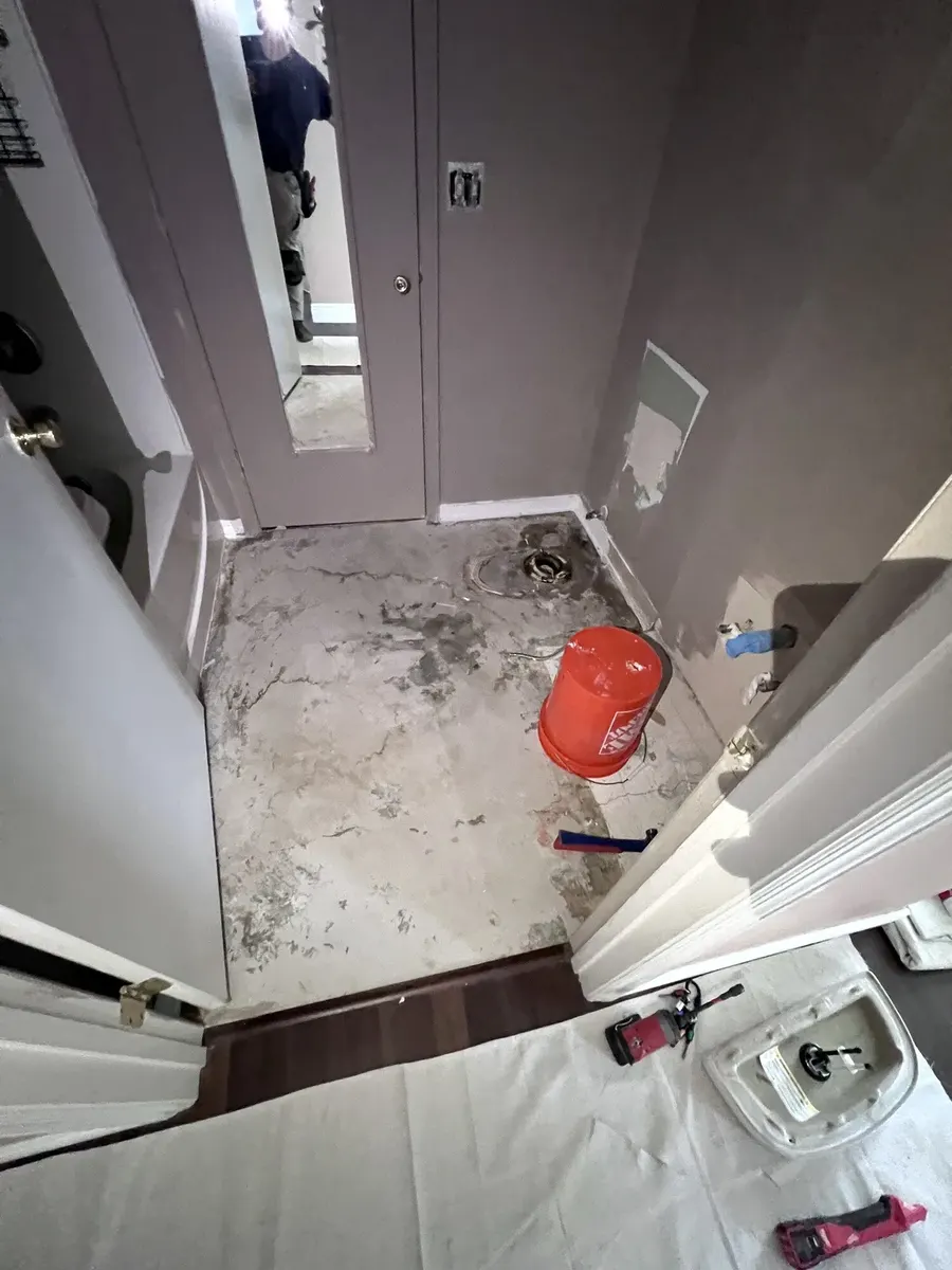 Bathroom floor prepared for new LVP
