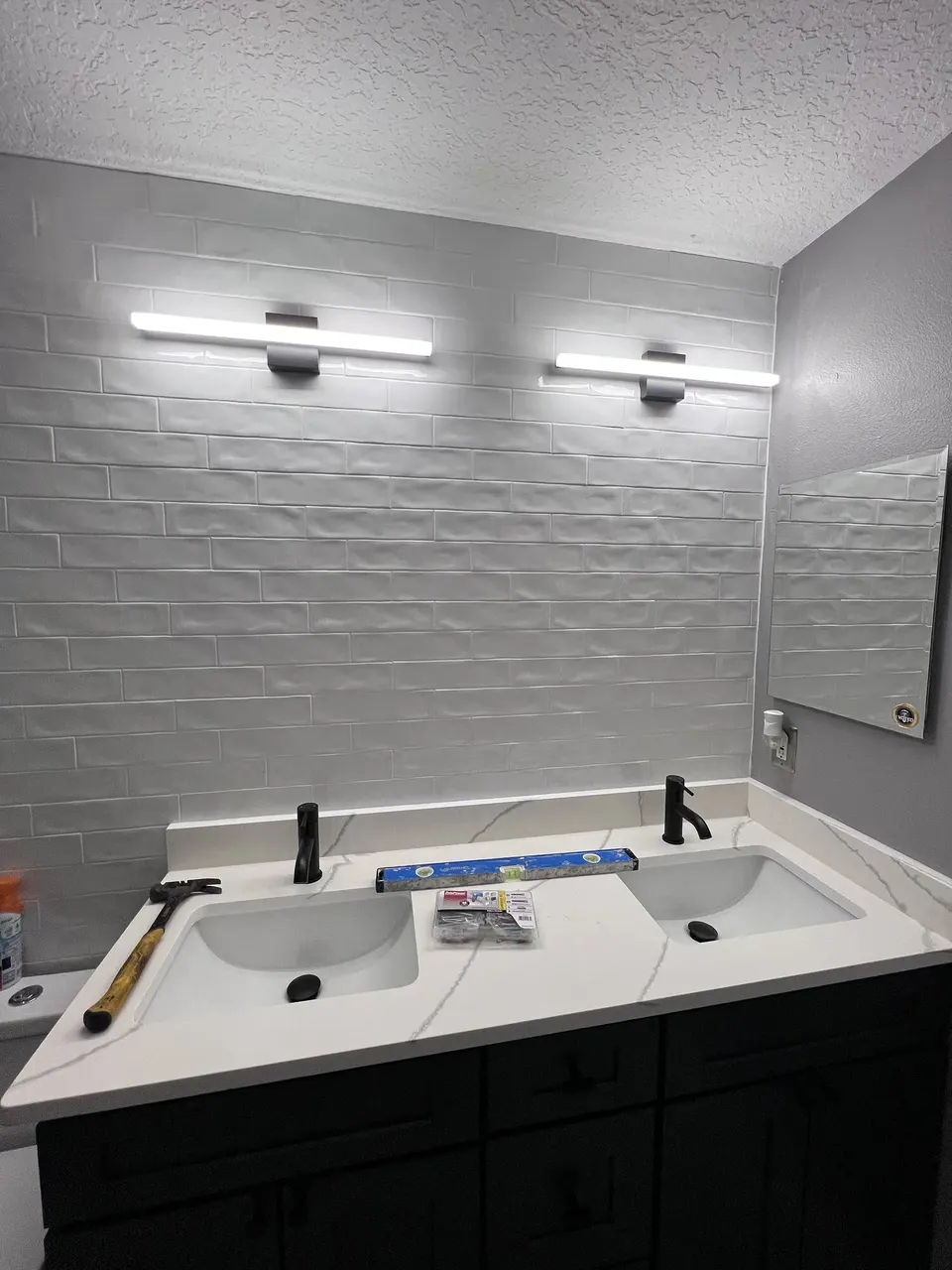 Double vanity wall before the mirrors were installed