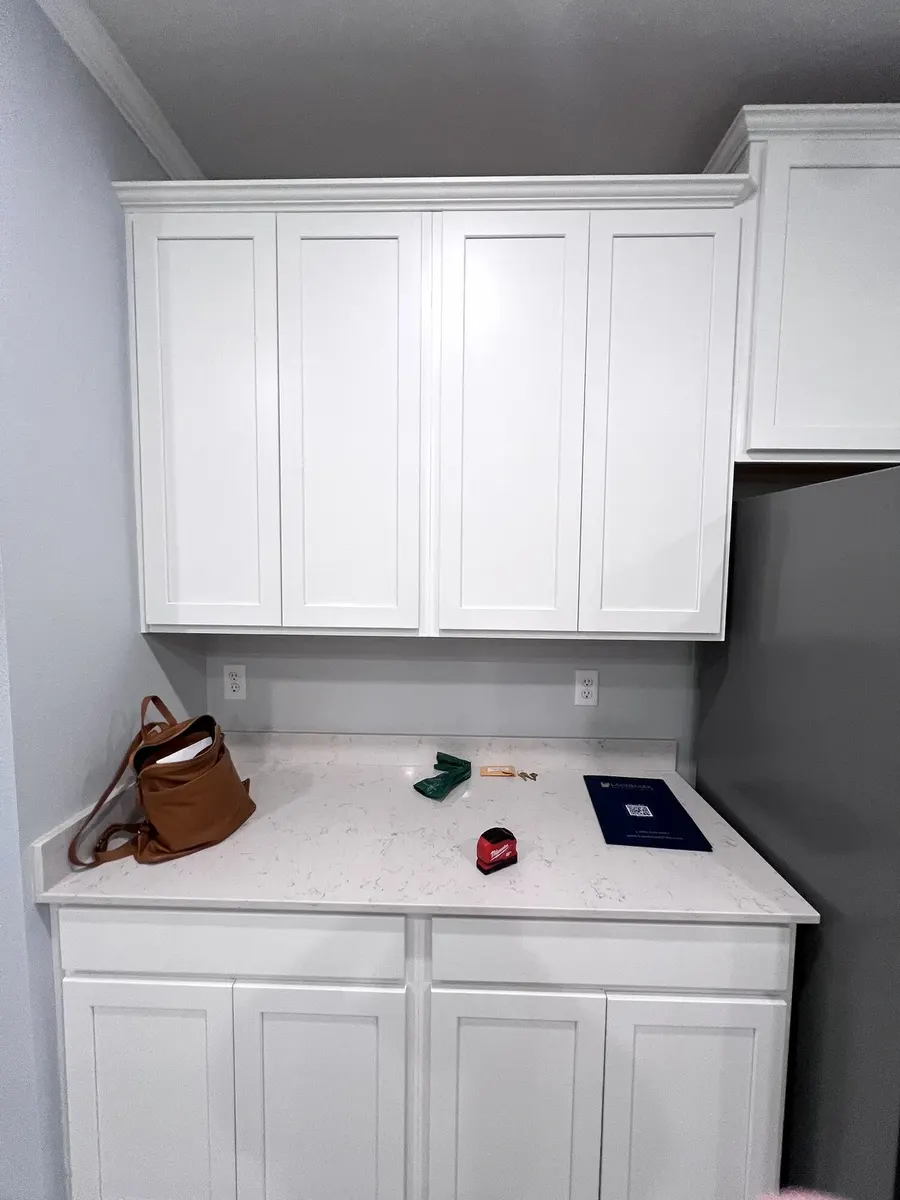 Kitchen before the full-height tile backsplash