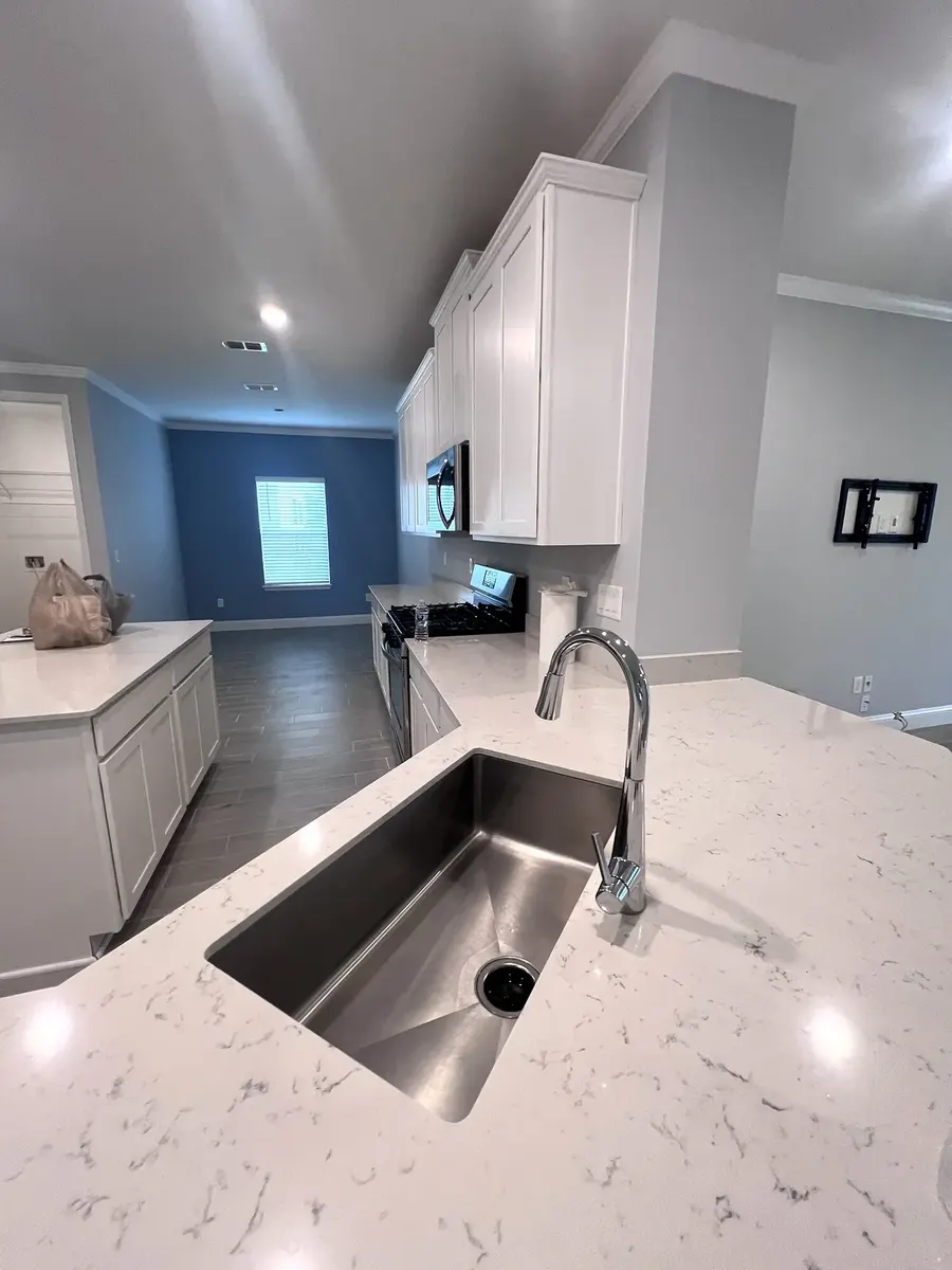 Original short countertop backsplash before removal