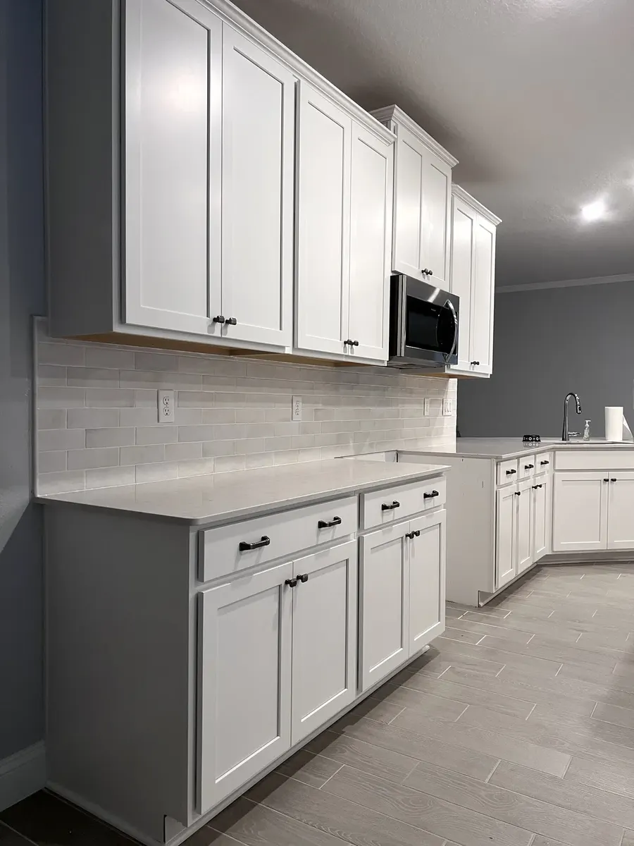Finished ceramic tile backsplash around the sink