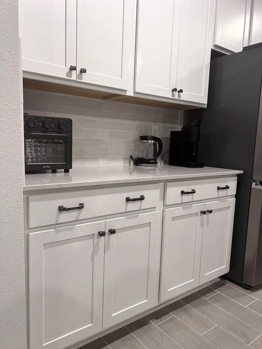 Wide view of the finished kitchen backsplash