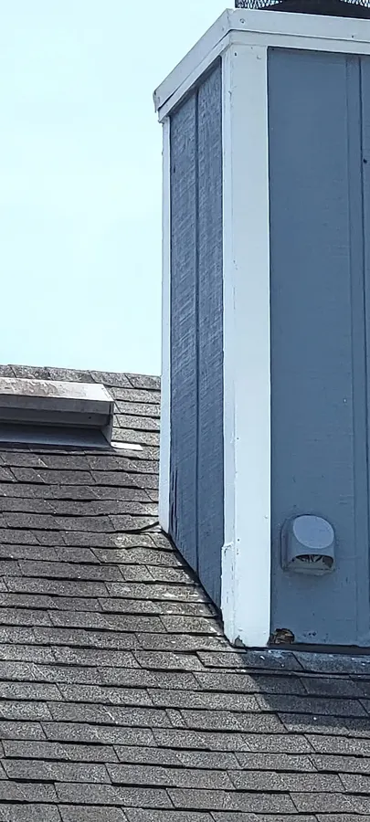 Second view of the deteriorated chimney exterior