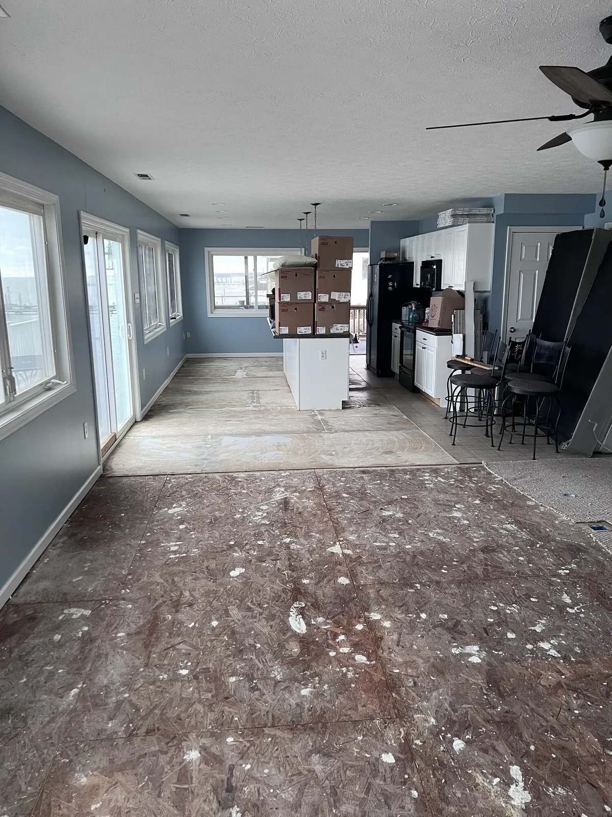During photo 1 of the whole-home lvp flooring