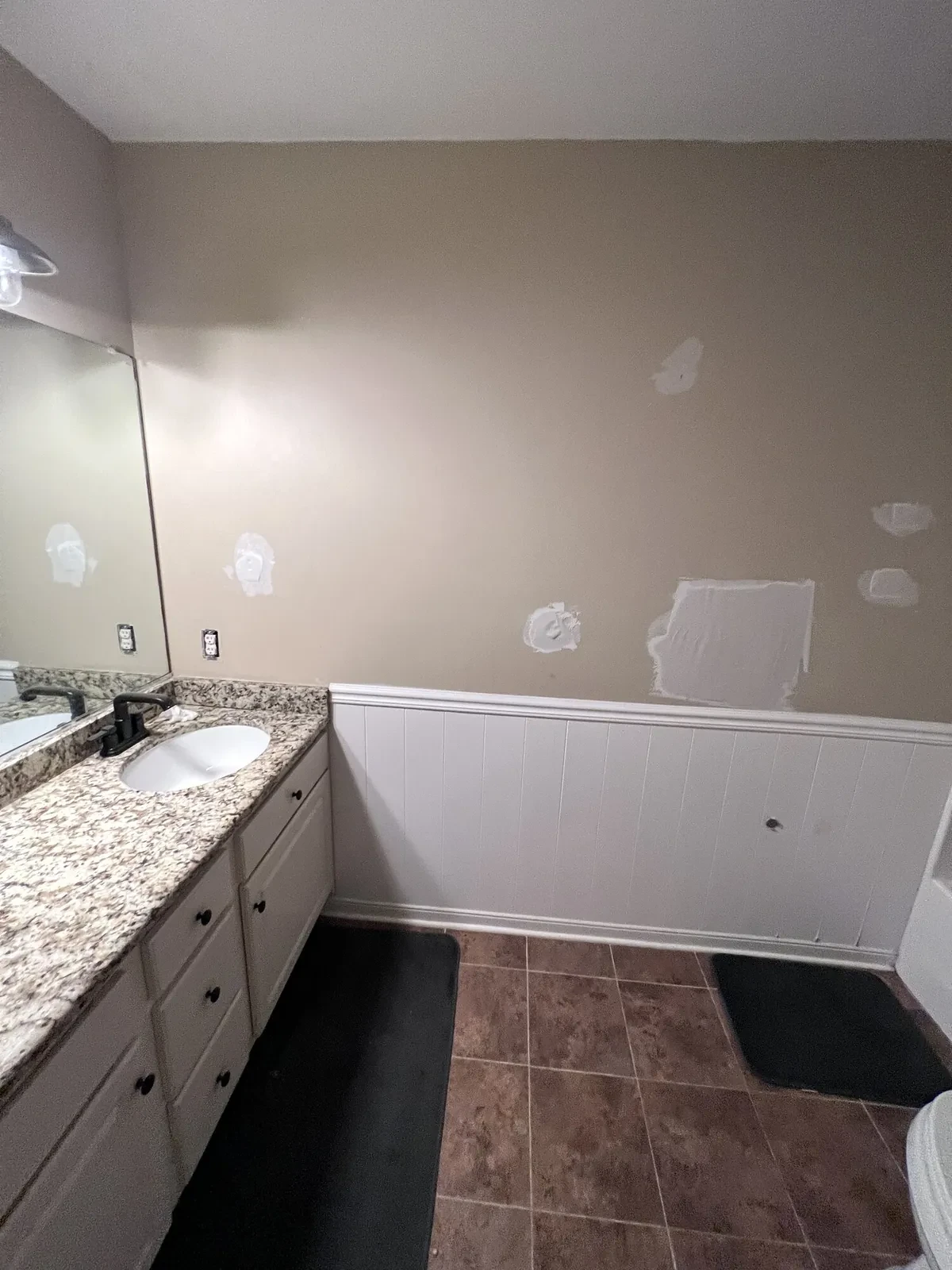 During photo 1 of the two-bathroom update