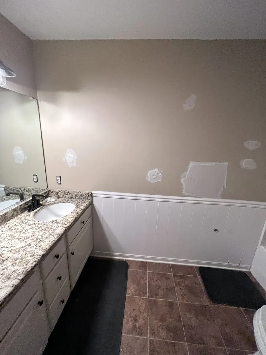 During photo 1 of the two-bathroom update