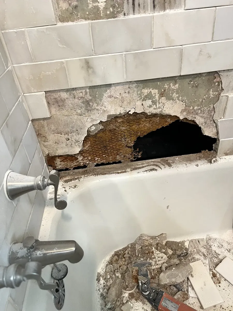 During photo 1 of the marble-look tub surround