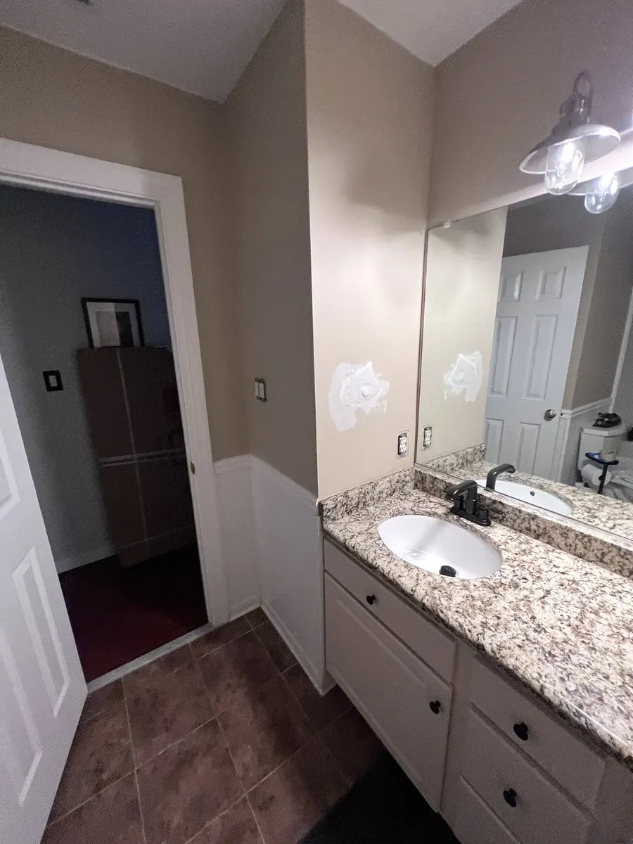 During photo 2 of the two-bathroom update