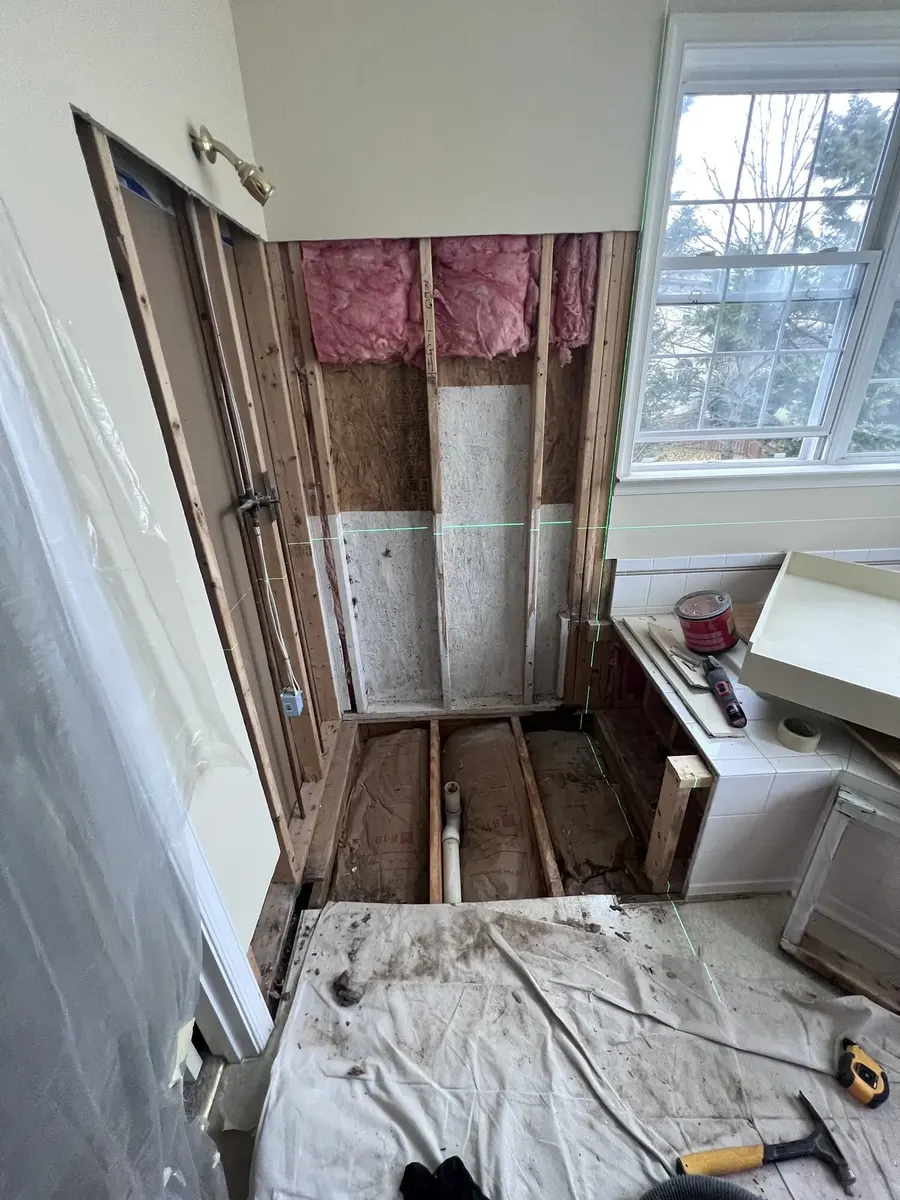 During photo 3 of the custom shower rebuild