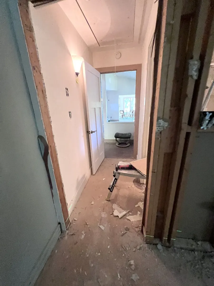 During photo 3 of the primary bathroom remodel
