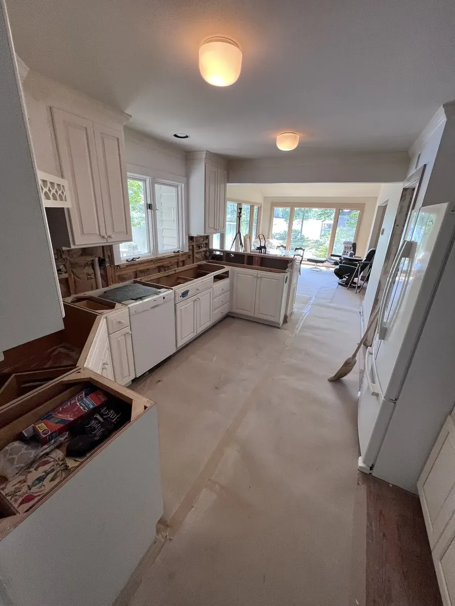 During photo 3 of the kitchen countertops & backsplash