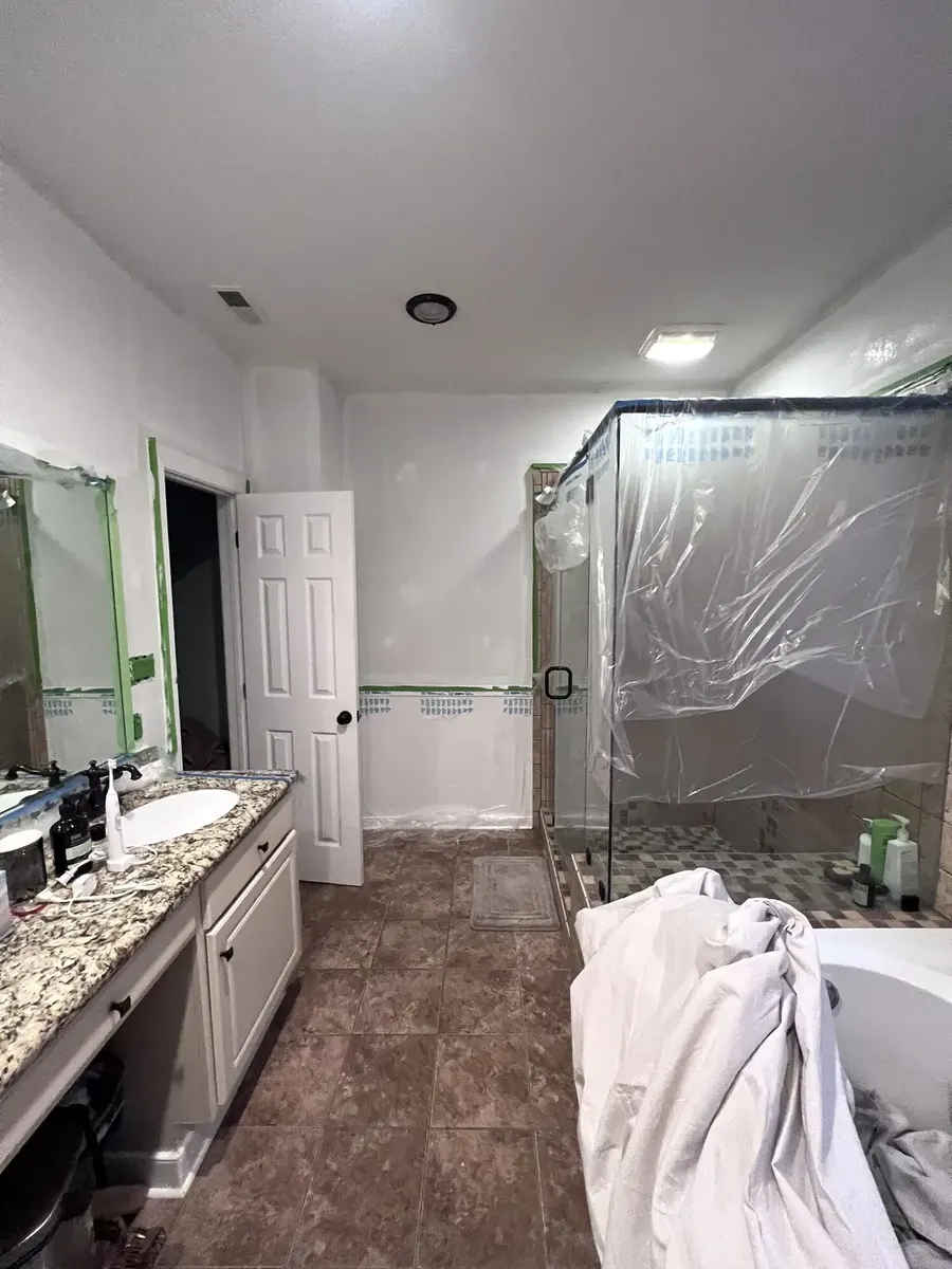 During photo 3 of the two-bathroom update