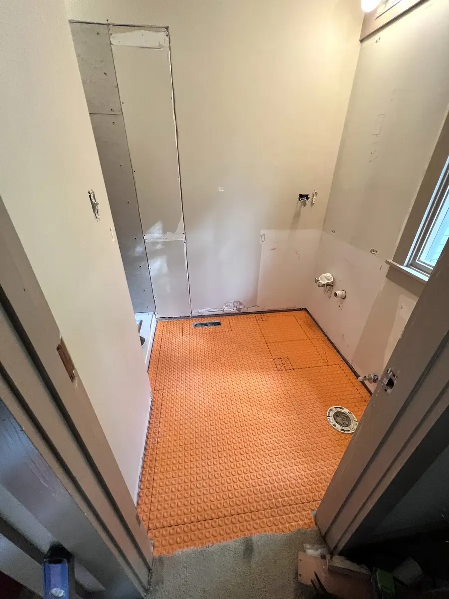 During photo 4 of the full bathroom renovation