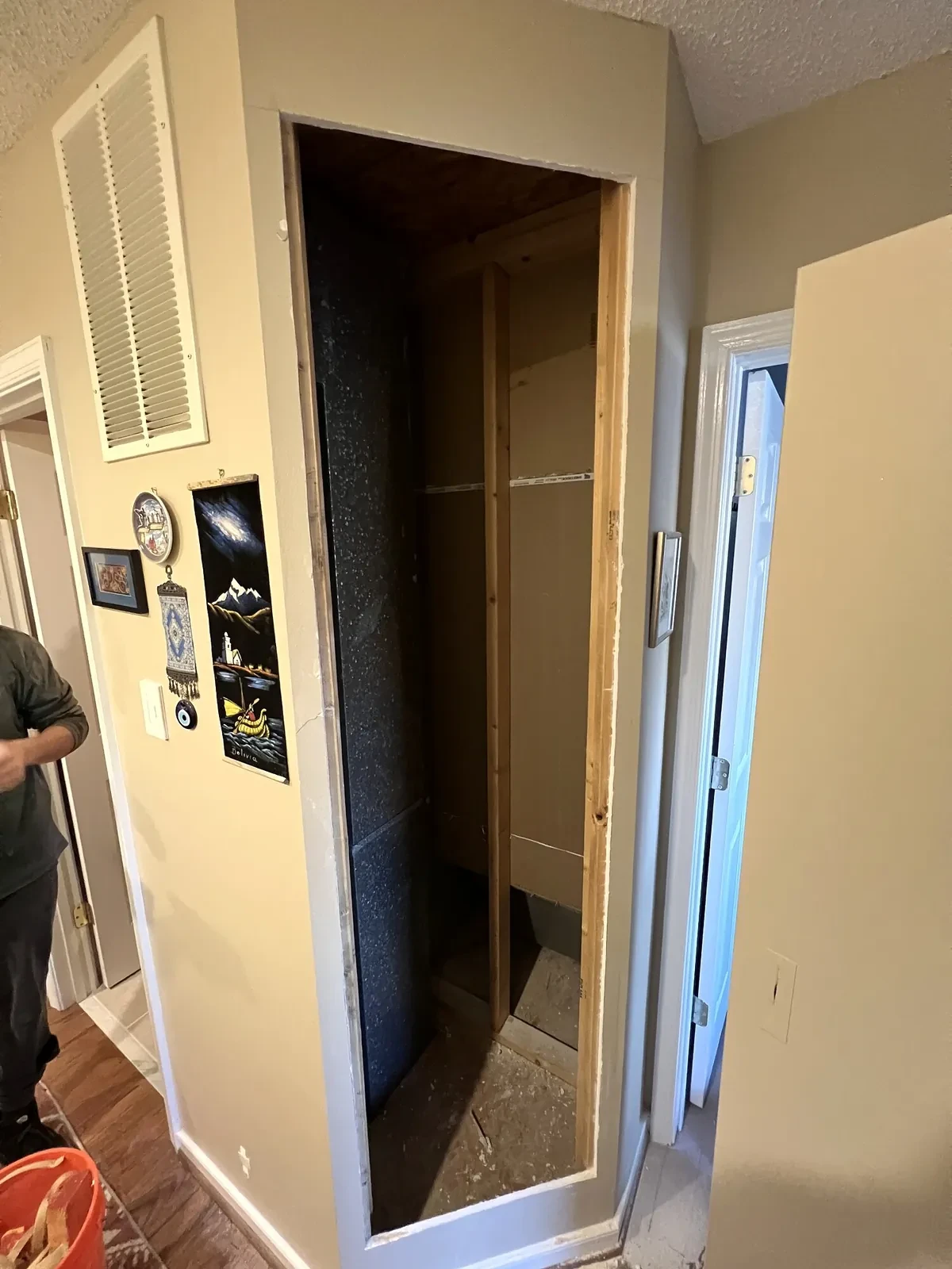 During photo 4 of the custom linen built-in