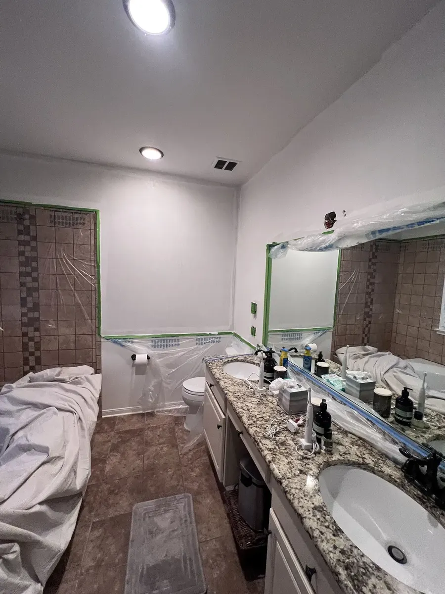 During photo 4 of the two-bathroom update