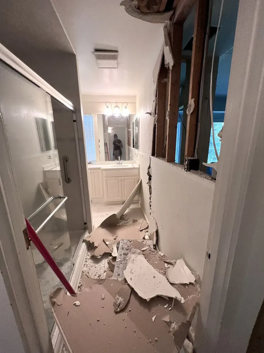 During photo 4 of the primary bathroom remodel