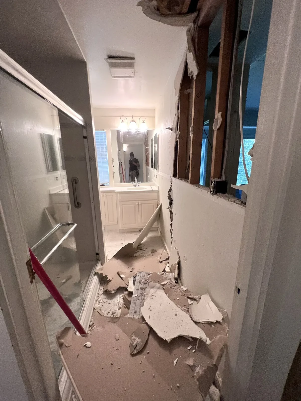 During photo 4 of the primary bathroom remodel
