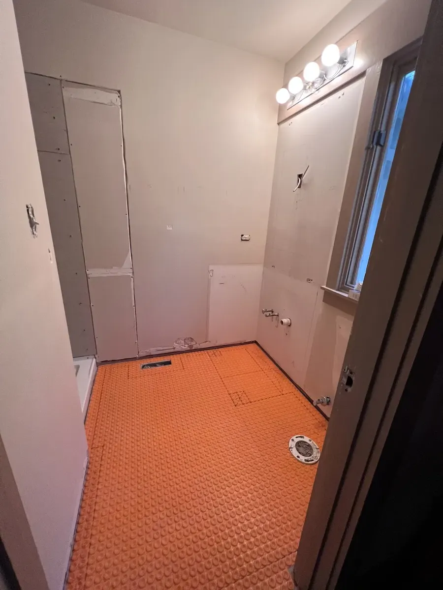 During photo 5 of the full bathroom renovation