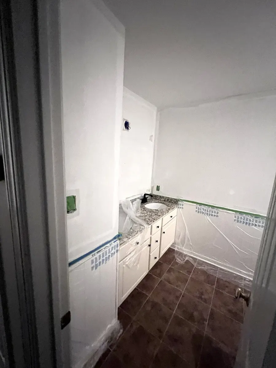 During photo 5 of the two-bathroom update