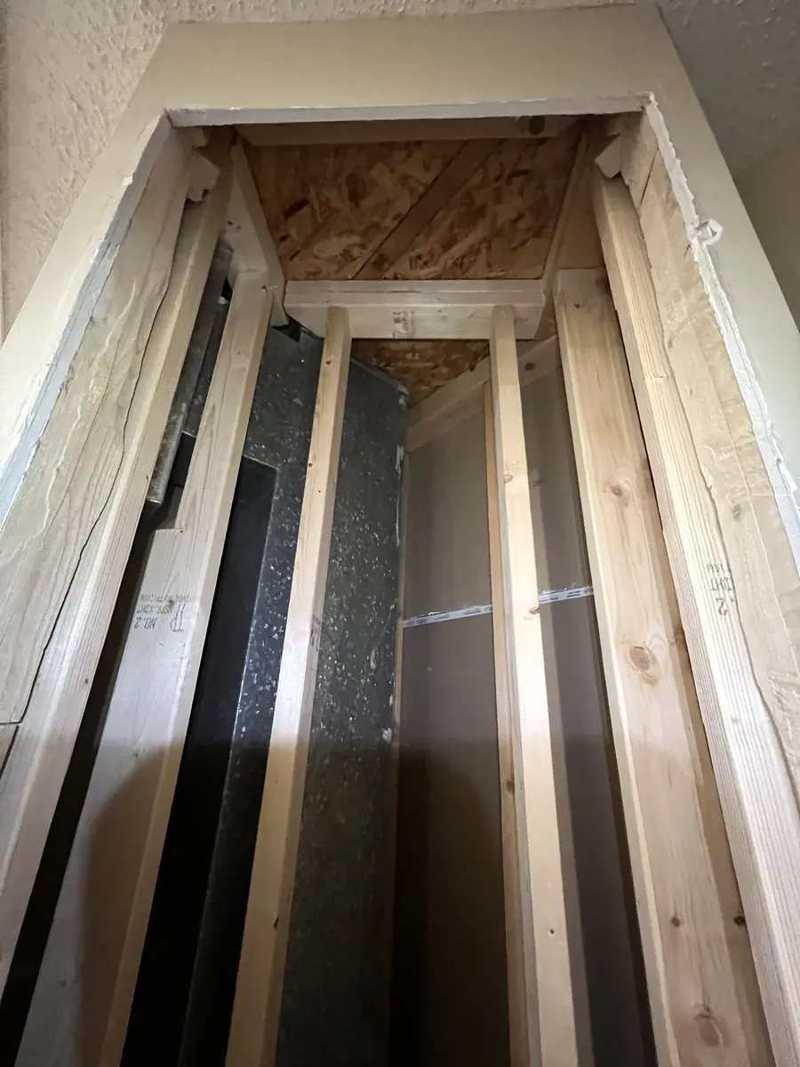 During photo 6 of the custom linen built-in