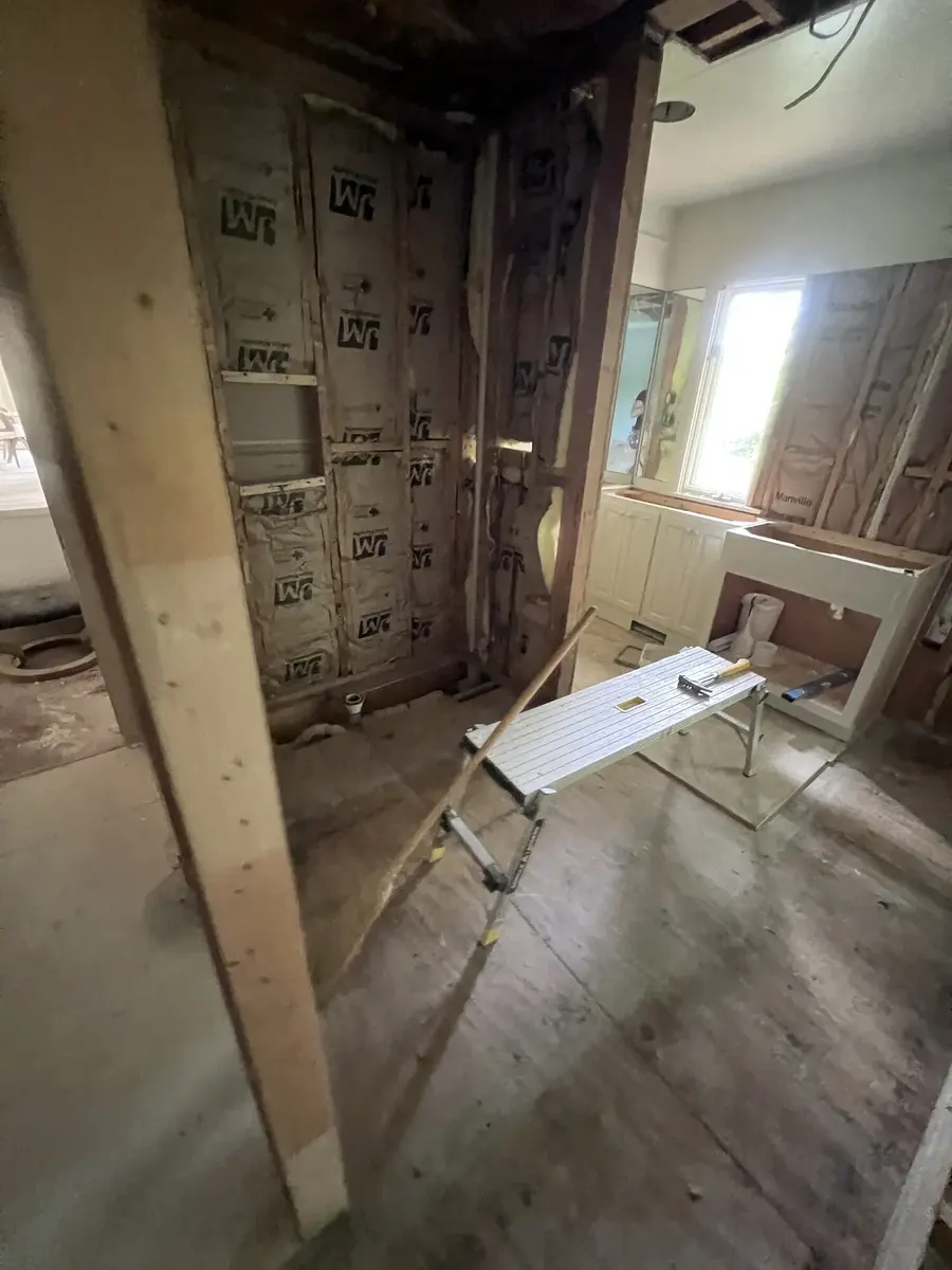 During photo 6 of the primary bathroom remodel