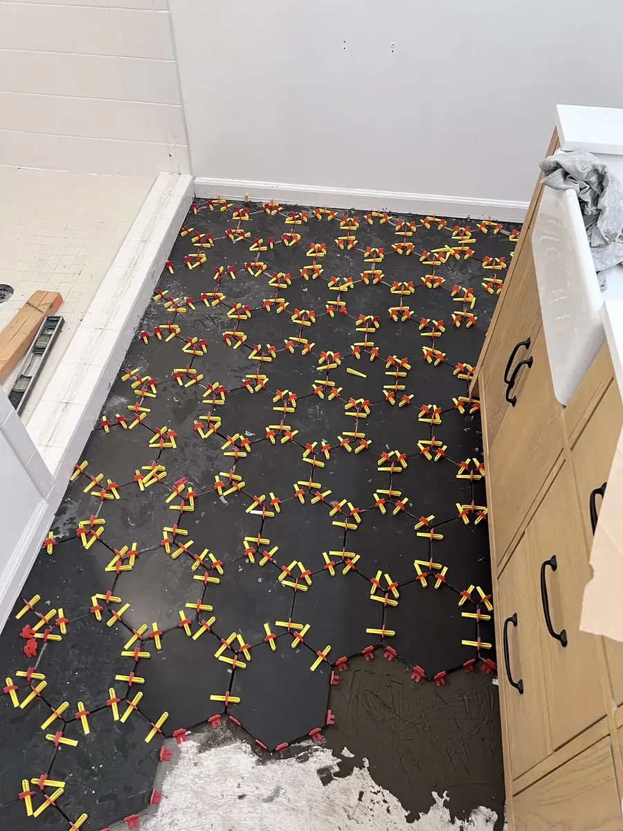 During photo 6 of the hex tile bathroom update