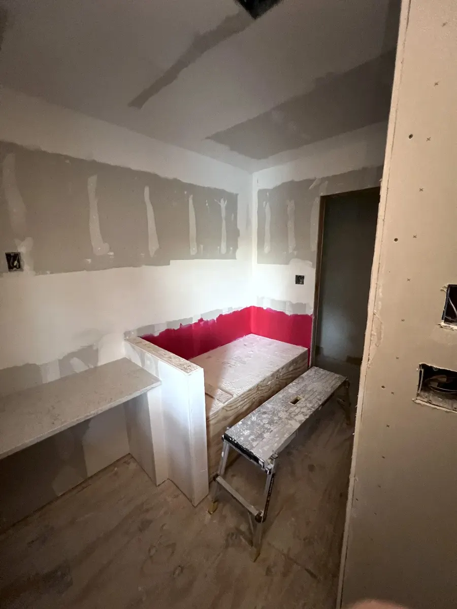 During photo 17 of the primary bathroom remodel
