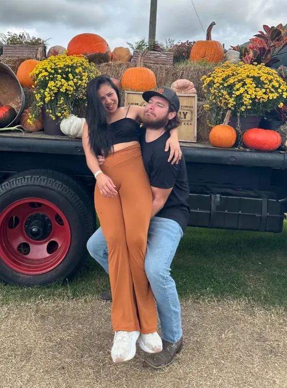 Montana and his wife sharing a lighthearted moment in Jacksonville, FL