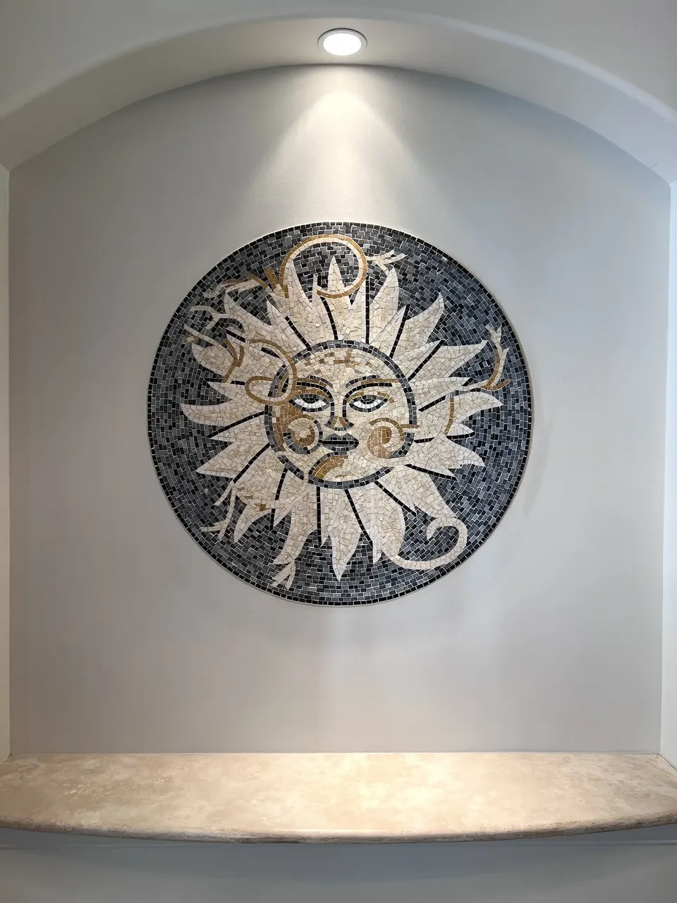 Finished decorative mosaic medallion in a St. Augustine entryway niche