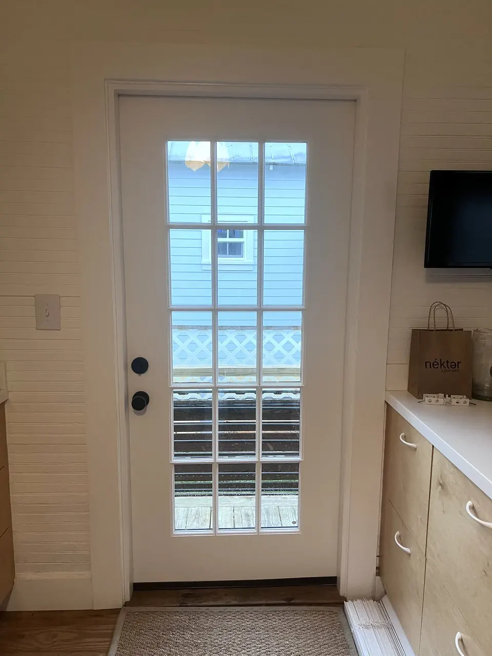 Finished black exterior kitchen door in St. Augustine, Florida