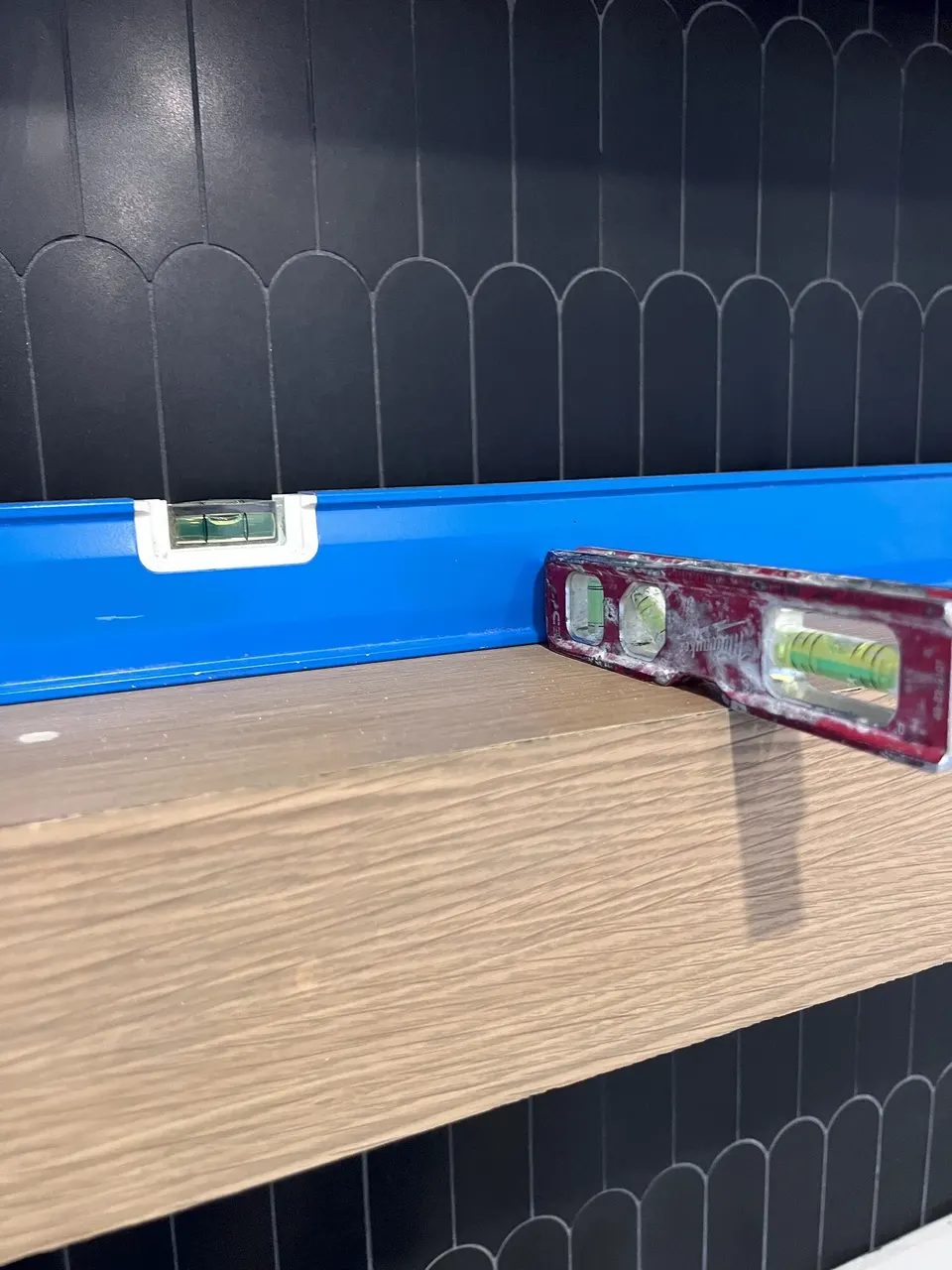 Final shelf support and lighting checks