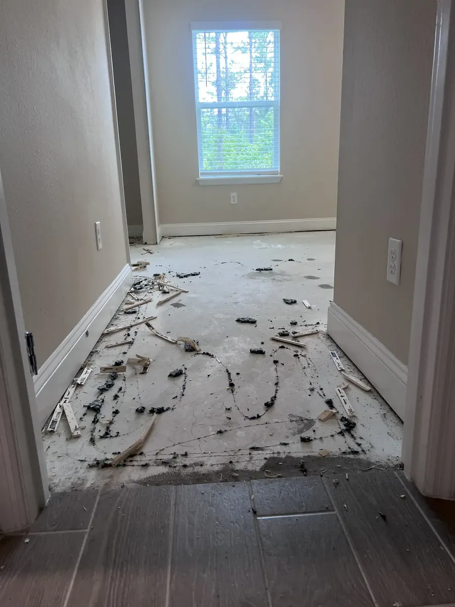 Concrete slab exposed during carpet removal
