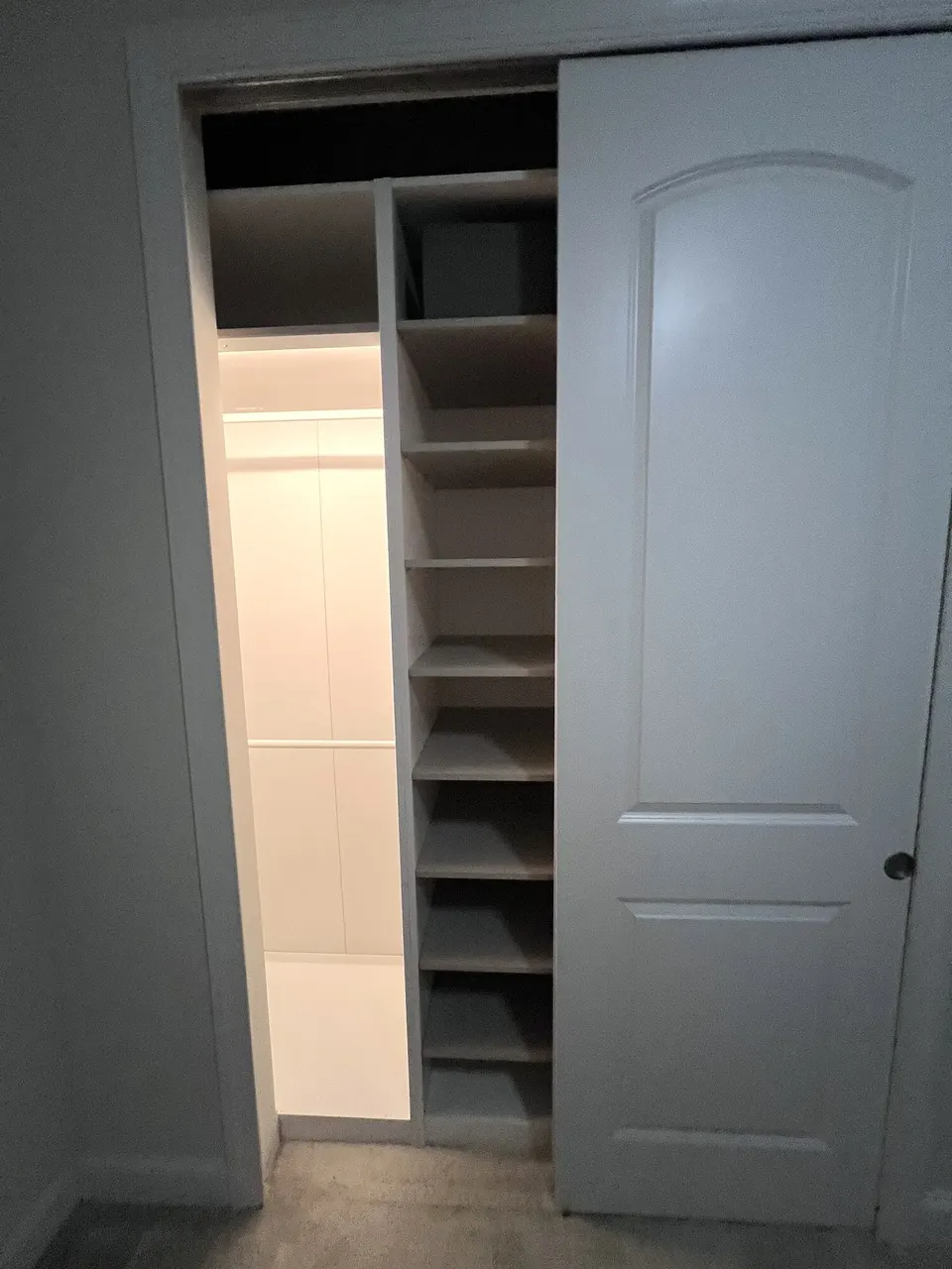PAX wardrobe storage visible through the closet doors