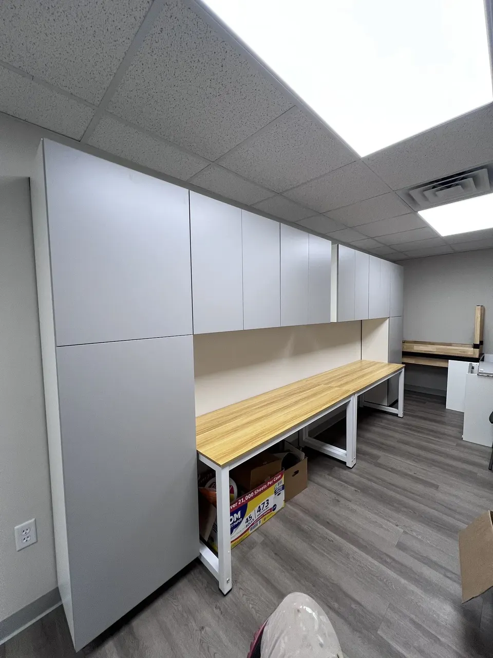 Finished row of white IKEA wall cabinets in Jacksonville, Florida