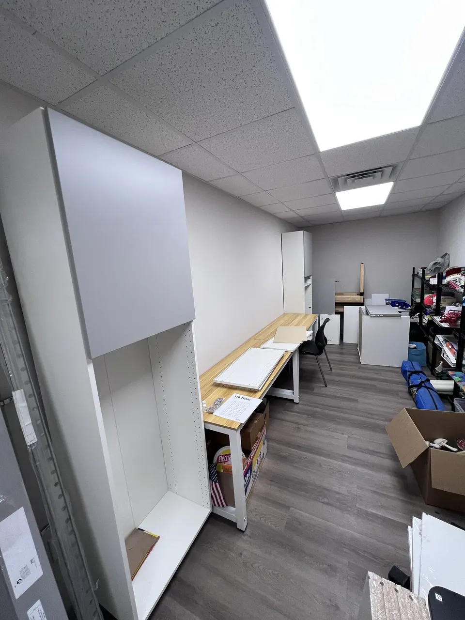 Cabinet frames positioned during the wall storage installation