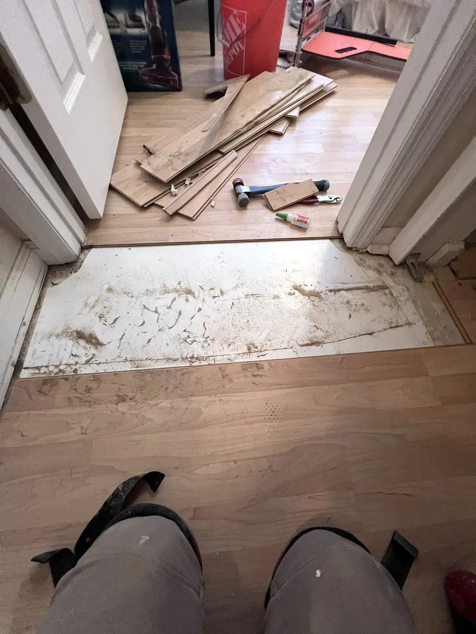 Damaged laminate opened for a localized flooring repair